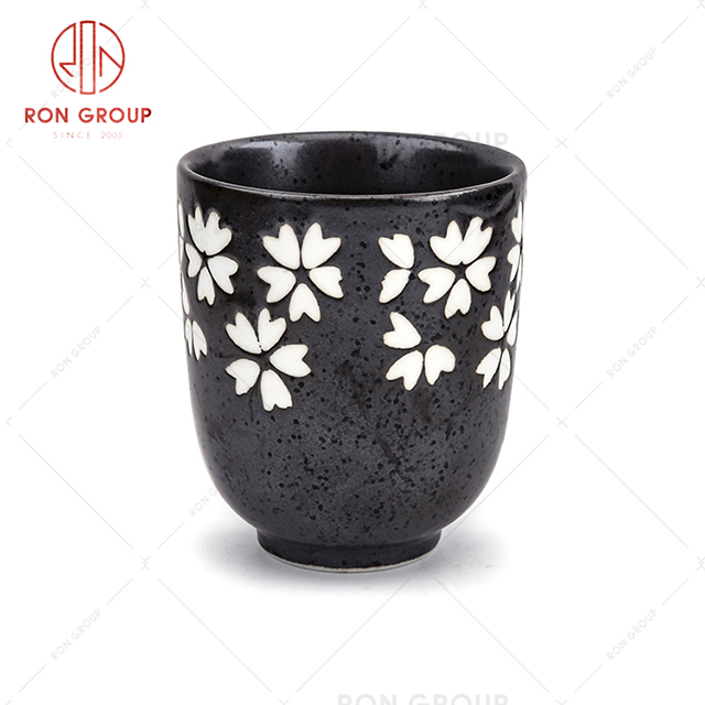 Eye catching design white flower pattern black ceramic decoration drinking tea cup